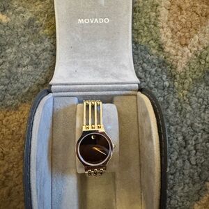 Movado Woman’s Two tone Gold and Black Watch